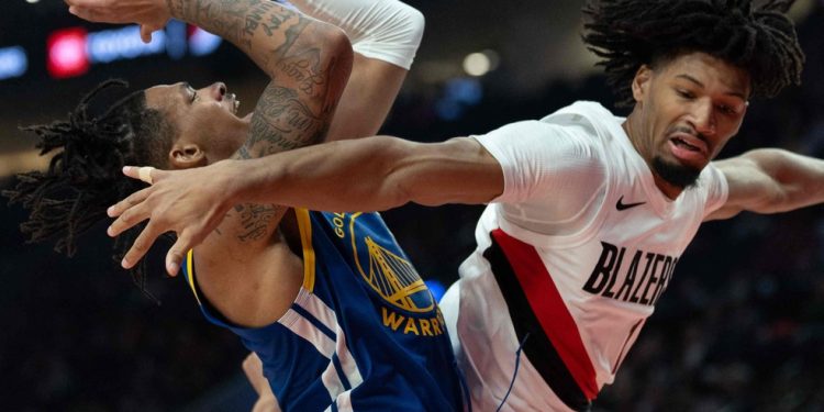 Shaedon Sharpe marca Will Richard, dos Warriors, em vitória dos Blazers — Foto: Tom Hauck/Getty Images/AFP