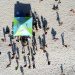 Praia e parque cheios de vida — Foto: Custódio Coimbra