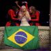 Lady Gaga exibe bandeira do Brasil durante show realizado em Copacabana, em maio: Os shows de estrelas internacionais na no bairro ajudam a manter a visitação até na baixa temporada. — Foto: Kevin Mazur