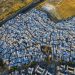 Vista aérea mostra o bairro "Un Nuevo Amanecer" (Um Novo Amanhecer), na comuna de Cerrillos, Região Metropolitana de Santiago, em 11 de novembro de 2025 — Foto: JAVIER TORRES / AFP