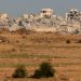 Imagem de prédios destruídos na Faixa de Gaza, em área próxima à fronteira com Israel — Foto: Jack GUEZ / AFP
