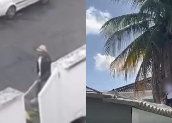 O vizinho da filha de Kelly Key carregando barra de ferro pelo condomínio e subindo nos muros das residências — Foto: Reprodução / Instagram