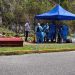 Peritos forenses exumam o corpo do preso político Víctor Quero Navas no cemitério Parque Jardín La Puerta, em Caracas, em 8 de maio de 2026 — Foto: AFP