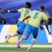 Vinicius Junior comemora, com Bruno Guimarães, o gol de empate da seleção brasileira com o Marrocos — Foto: Kevin C. Cox / GETTY IMAGES NORTH AMERICA / Getty Images via AFP