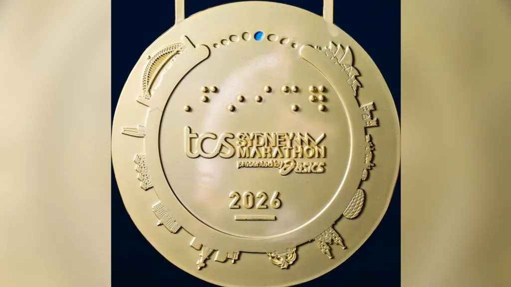 Engano? Público diz que design da medalha da Maratona de Sydney parece retratar estádio de Munique em vez de arena local