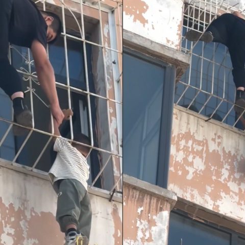 Menino de 5 anos é resgatado após ficar pendurado com a cabeça presa em grades de janela no sexto andar de prédio na China