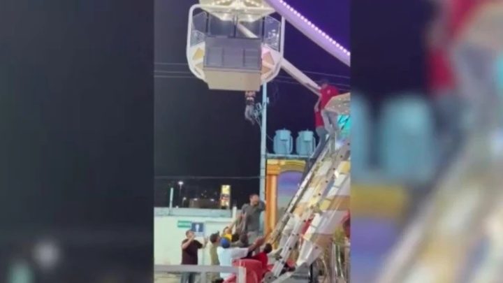 Menino fica pendurado do lado de fora de roda-gigante e precisa ser resgatado
